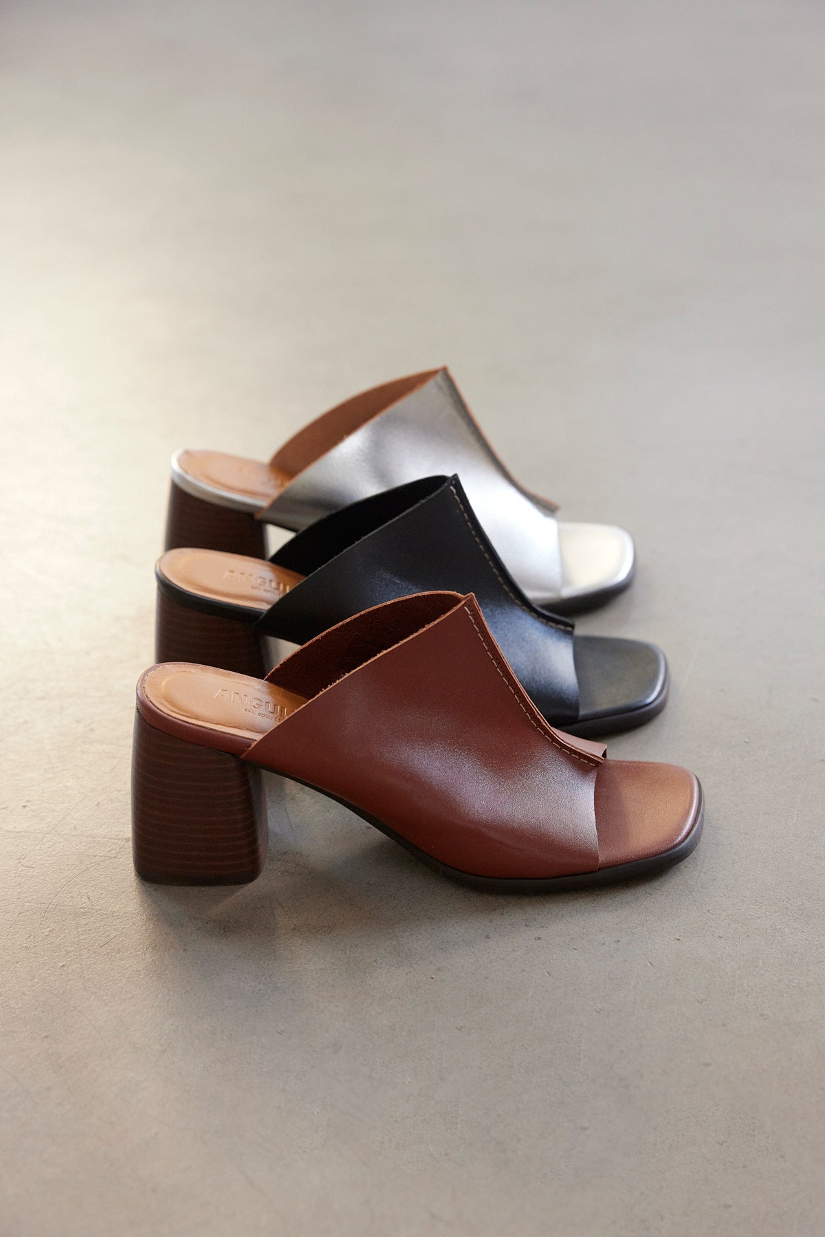 Mule with sculptural heel, Tan