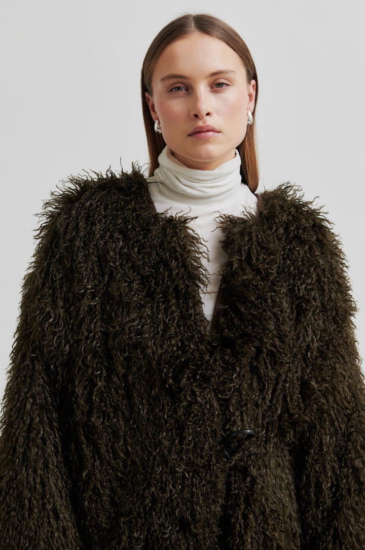 Ophie Coat, Delicioso